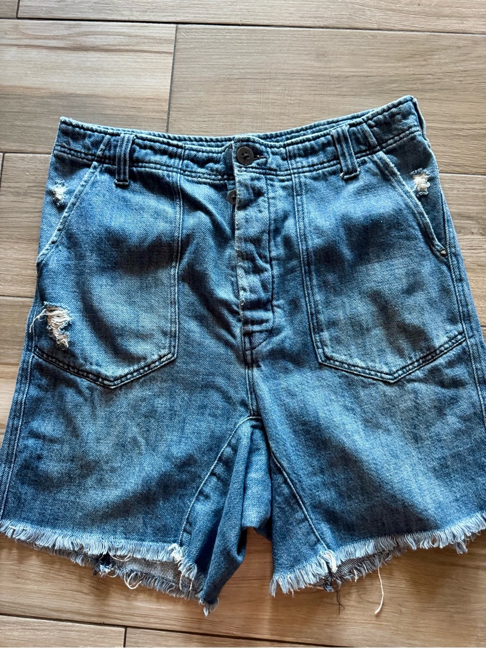 The Free Free People Distressed Acid Wash Denim Shorts Size 10